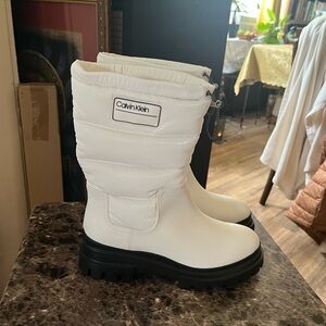 Calvin Klein White Quilted Puffer Boots with Black Lug Sole